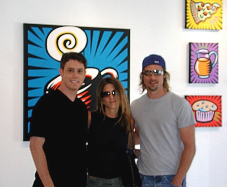 Jennifer Aniston and Brad Pitt visited one of Burton Morris' art shows in 2002.