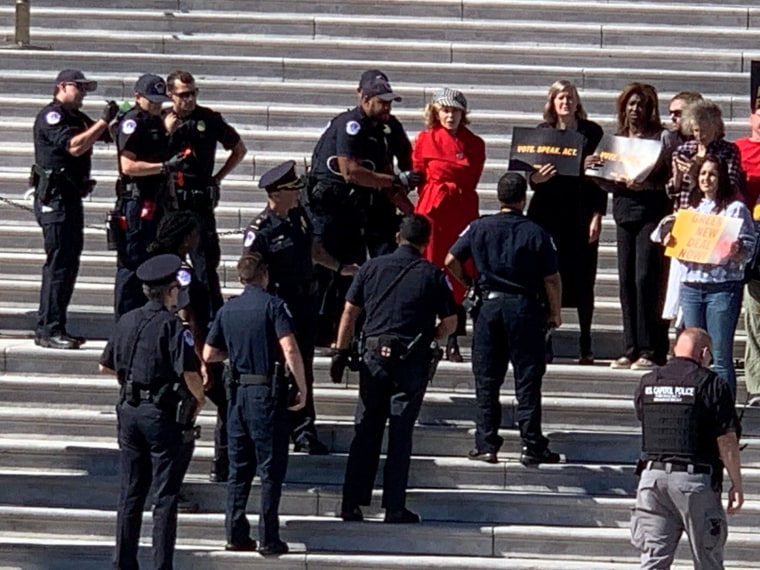 Image: Jane Fonda is seen being arrested during a climate change protest in Washington