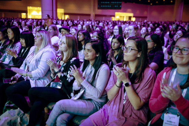 Audience members at the keynote speech of the Grace Hopper Celebration.