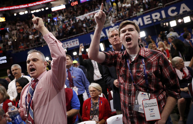 Image: Delegates scream and yell after announcment that the convention would not hold a roll-call vote at the Republican National Convention in Cleveland, Ohio