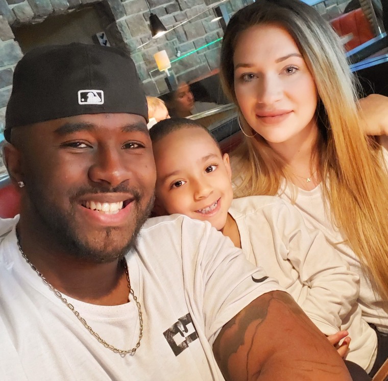 Writer Arnold Henry with his wife, Stephanie, and their oldest son, Amarion.