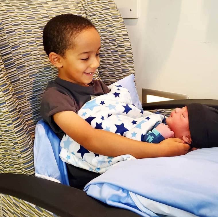 Henry's son, Amarion, meeting little brother Ajay for the first time.