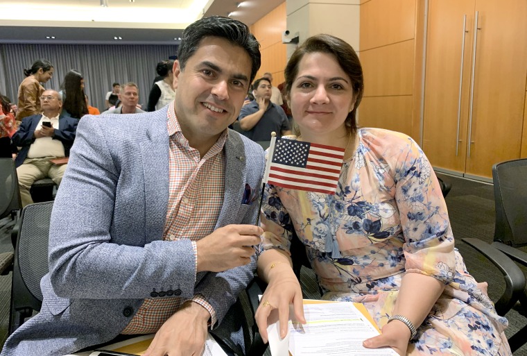 Yerevan Adham and his wife, Hawjeen Qadir, at their U.S. naturalization ceremony in Alexandria, Va., in 2019.