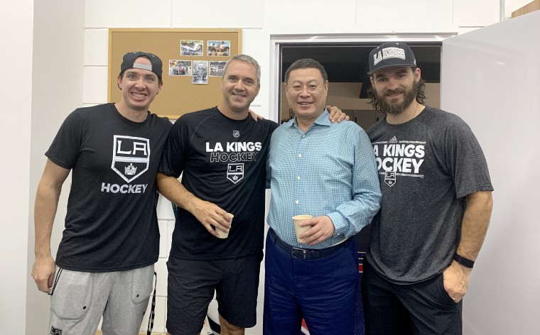 Kings coach Nick Lehr, goaltending Coach Bill Ranford, ORG Packaging Chairman Zhou Yunjie and alumni Peter Budaj at the Beijing Jr. Kings Camp held at ORG AZ Rink in Beijing in August.