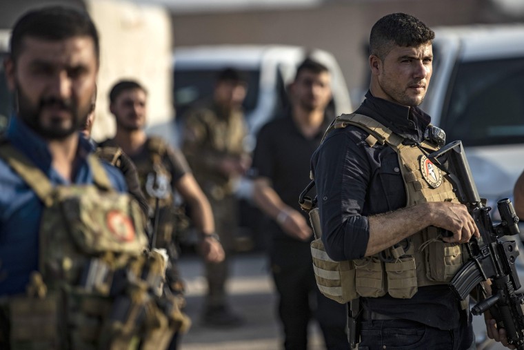 Image: Members of the Kurdish-led Syrian Democratic Forces