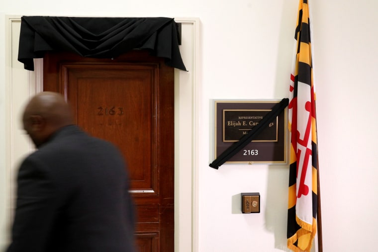 Image: A man passes by the office of the late Rep. Elijah Cummings in the Rayburn House Office Building on Capitol Hill on Oct. 17, 2019.