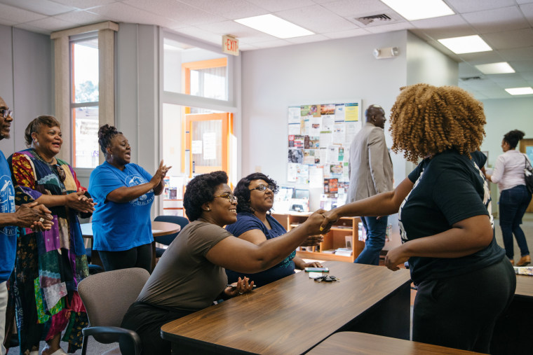 LaTosha Brown meets with community activists in Flint.