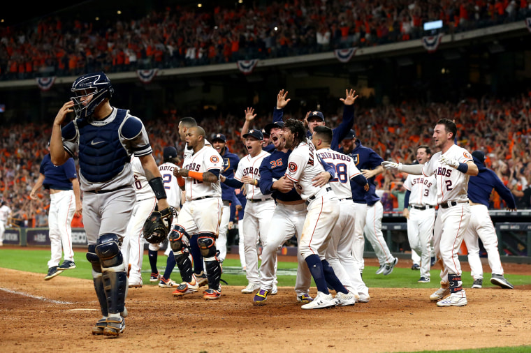 Image: The Houston Astros celebrate their win in the American League Championship Series over the New York Yankees in Texas on Oct. 19, 2019.