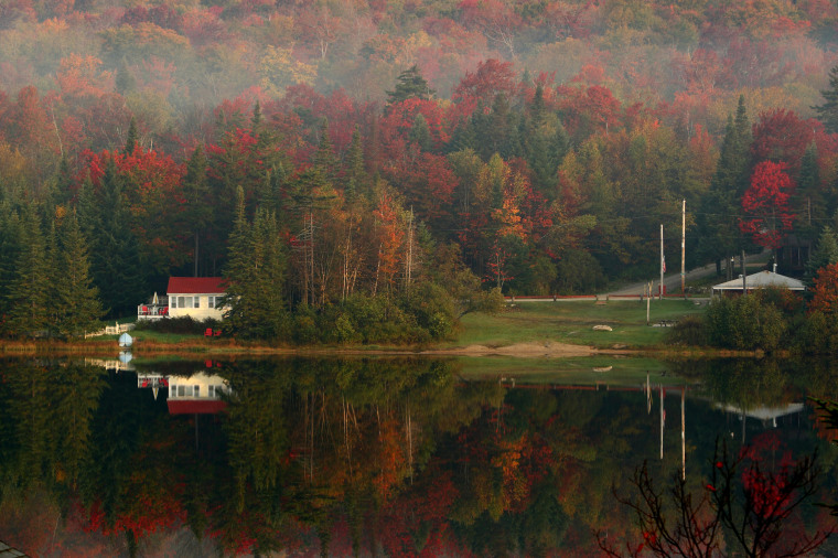 Image: Leaves begin turning color on Big Pond near Woodford, Vermont, in 2007.