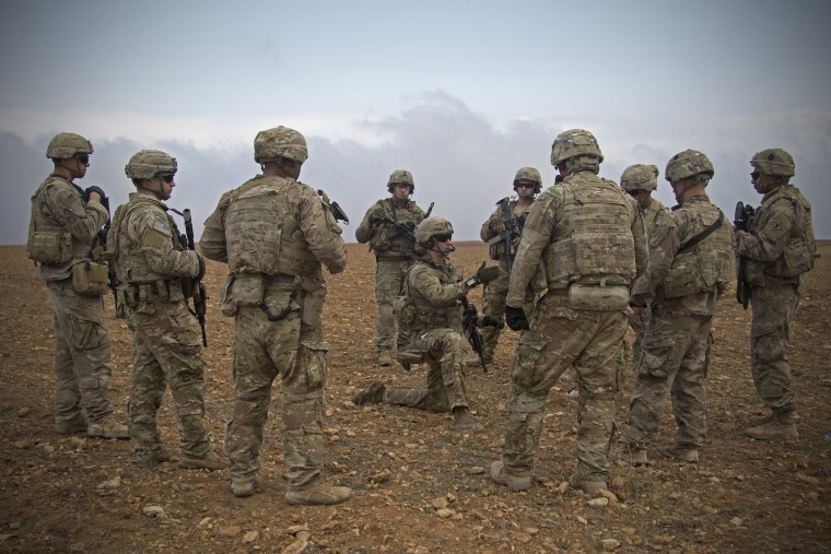 Image: U.S. soldiers gather for a brief during a combined joint patrol rehearsal in Manbij, Syria