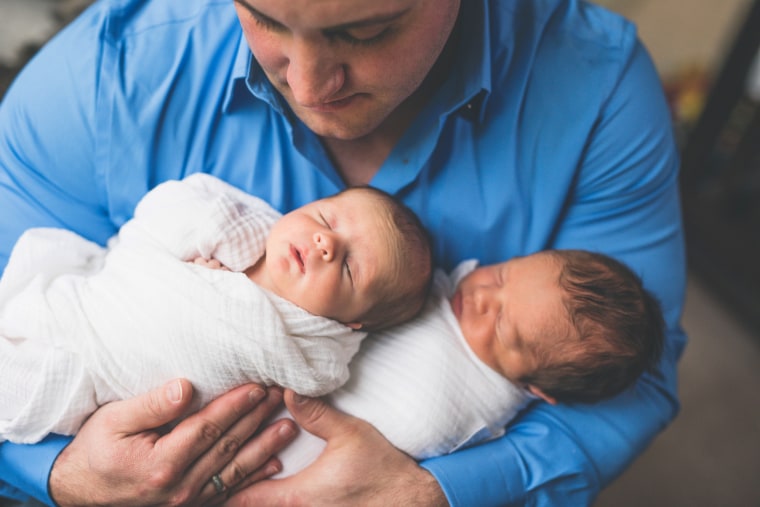 Image: Max Scherzer holds his twins, Max and Molly. Scherzer died by suicide in 2016.