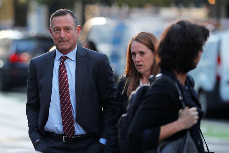 Image: Douglas Hodge arrives at the federal courthouse in Boston