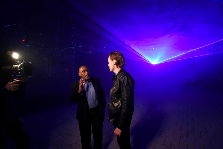 Image: Al Roker speaks with Dutch artist Daan Roosegaarde at the "WATERLICHT" installation at Columbia University.