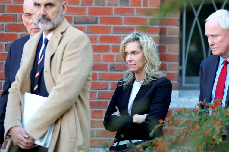 Image: Jane Buckingham walks in to the federal courthouse for her sentencing hearing in Boston