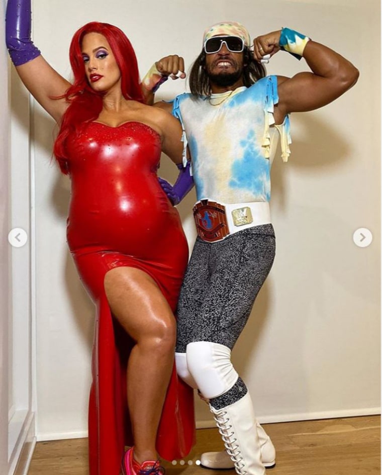 Ashley Graham poses with her husband Justin Ervin in their 2019 Halloween costumes as Jessica Rabbit and Randy Savage.