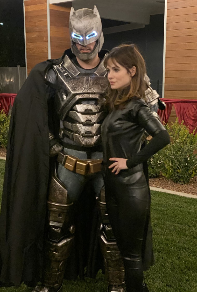 Scott and Deschanel dressed as Batman and Catwoman at Scott's older brother's Halloween wedding.