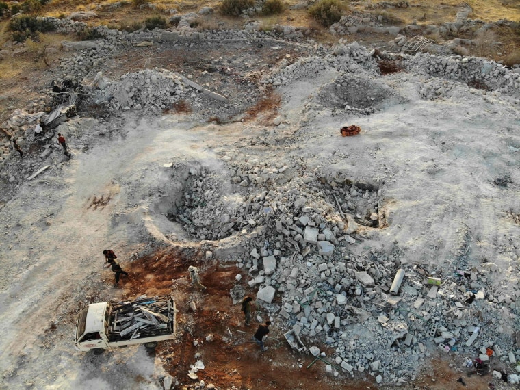 Image: An aerial view of the site that was hit by helicopter gunfire which reportedly killed nine people near the northwestern Syrian village of Barisha in the Idlib province along the border with Turkey