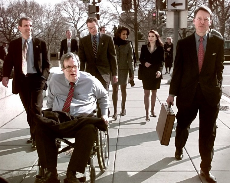 Image: White House Counsels Bruce Lindsey, left, and Charles Ruff depart the White House with President Bill Clinton's personal attorneys Nicole Seligman and David Kendall, right, on Feb. 12, 1999.