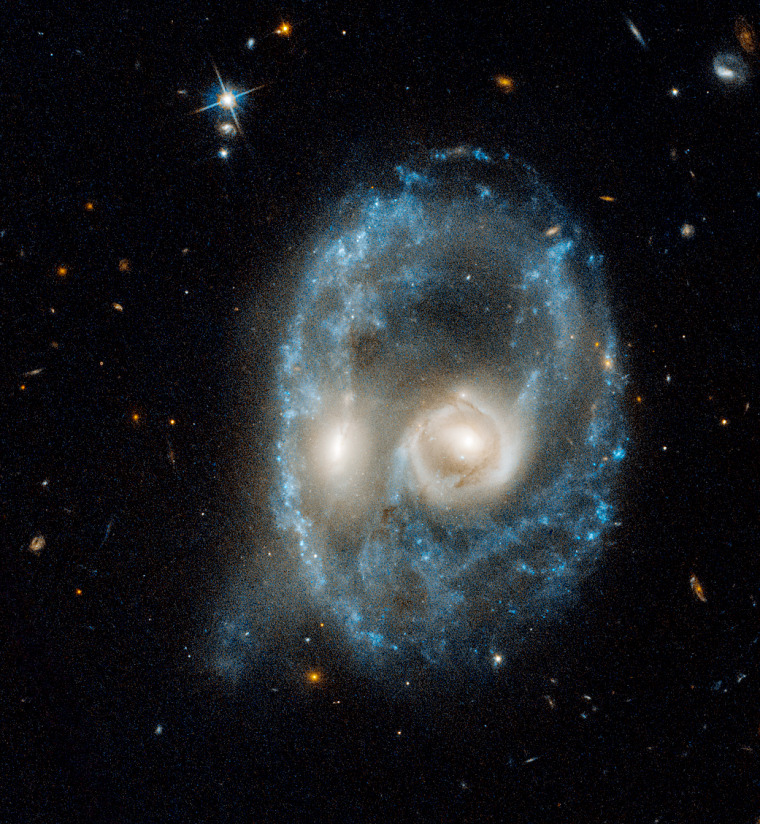 Image: A menacing looking face was formed by a collision between two galaxies.