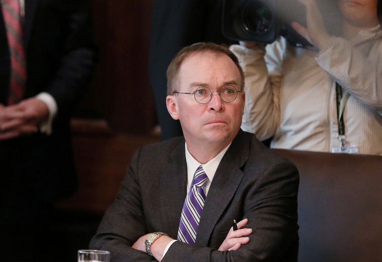 Image: FILE PHOTO: Acting White House Chief of Staff Mulvaney listens during Trump cabinet meeting at the White House in Washington