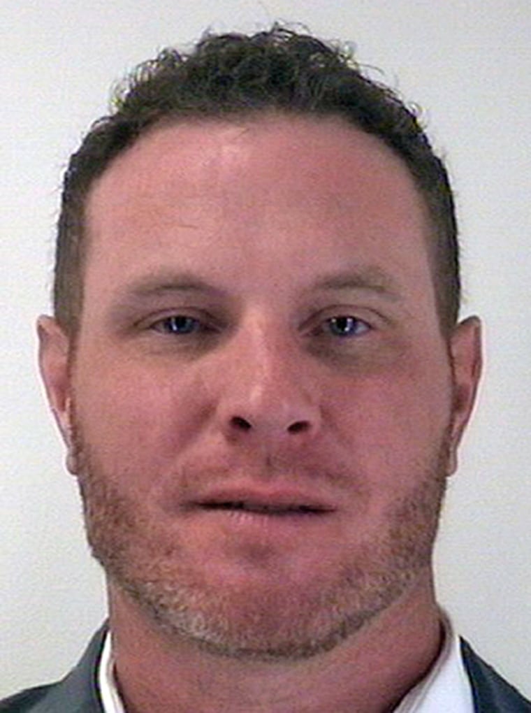 Former MLB star Josh Hamilton turns himself in on warrant for