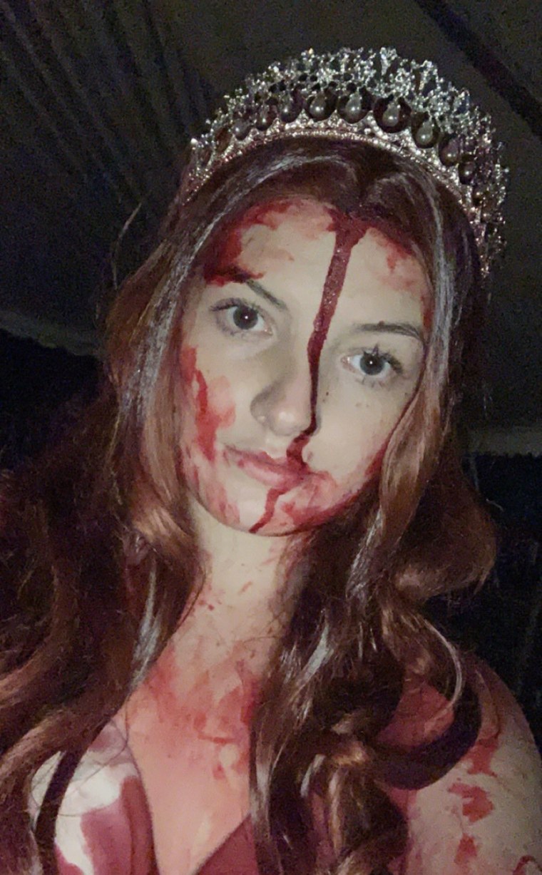 Sidney Wolfe, 20, was at a haunted house over the weekend dressed as Stephen King's "Carrie," with fake blood covering her face.
