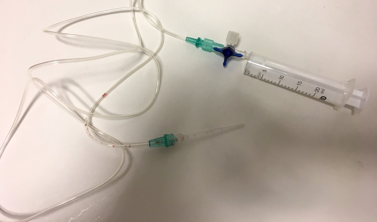 Image: syringe and pump