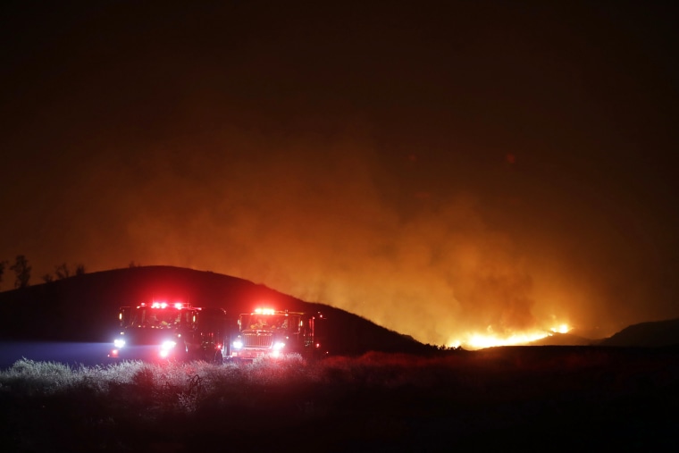 Photos: California battles wind-fueled wildfires