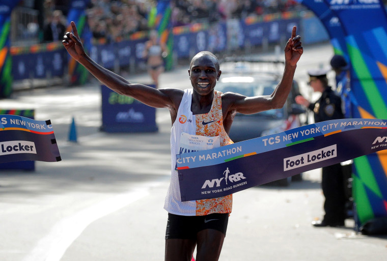 Image: Kenya's Geoffrey Kamworor crosses the finish line to win the elite men's race in the New York City Marathon on Nov. 3, 2019.