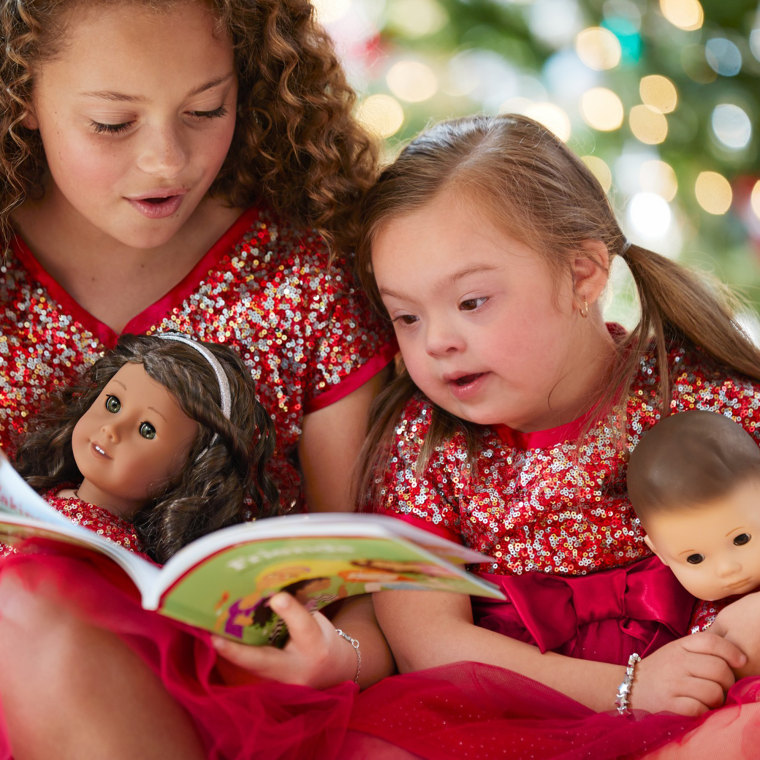 Ivy Kimble, who has Down syndrome, appears in a new American Girl catalog. 