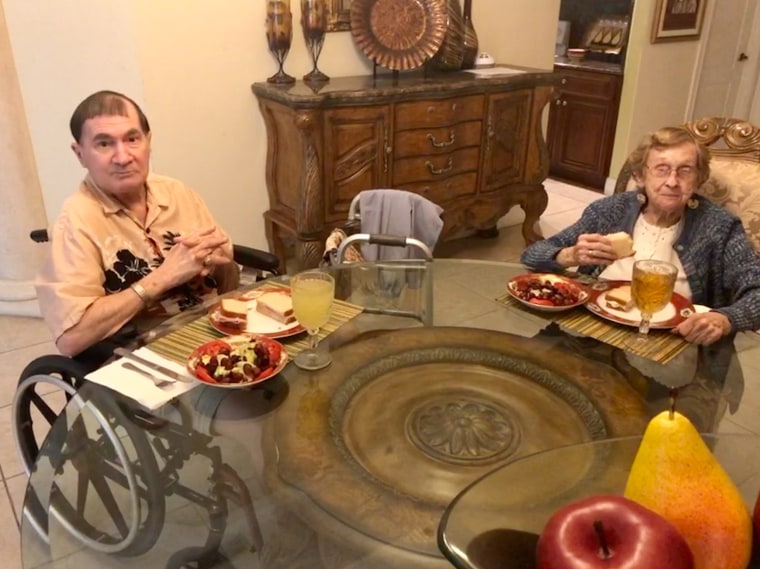 Henry W. Sterrett III, 73, and Henryette Marshall, 95, enjoy a family-like setting in their medical foster home in Port St. Lucie, Florida.