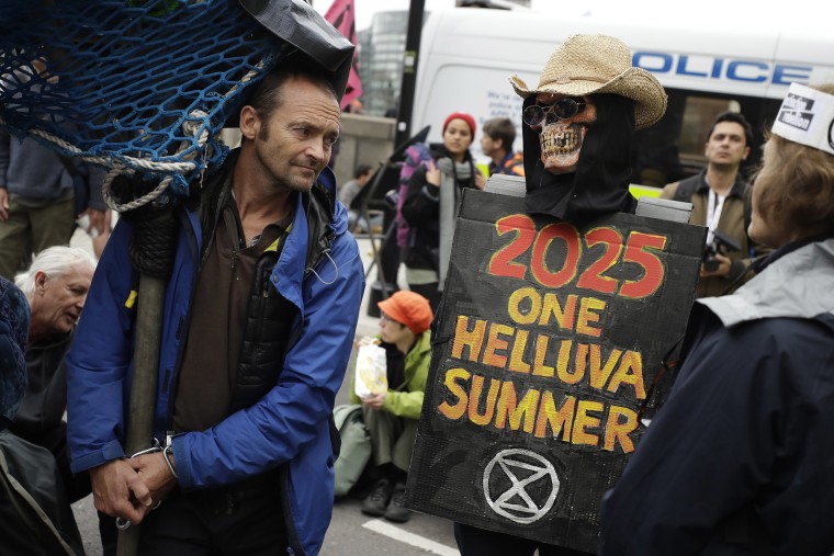 Image: Climate protesters block Millbank in central London