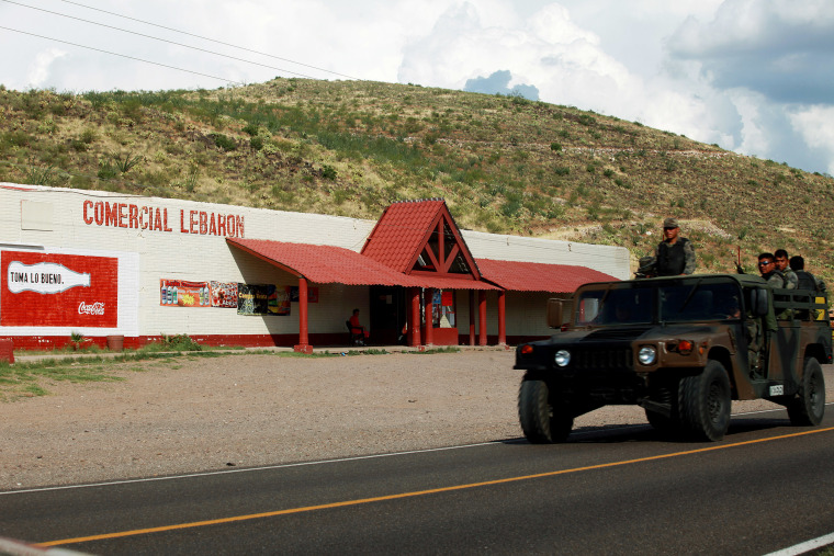 Image: An army car patrols the street in Colonia LeBaron in Chihuahua, Mexico, in 2009. The government sent soldiers and state police to protect the town after a gunmen killed a Mormon anti-violence activist.