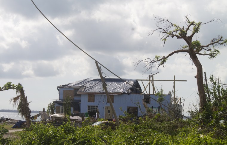 About 500 people live on Green Turtle Cay and, with nearly half of the barrier island's structures flattened by Hurricane Dorian, they are now sharing whatever dry housing remains. 