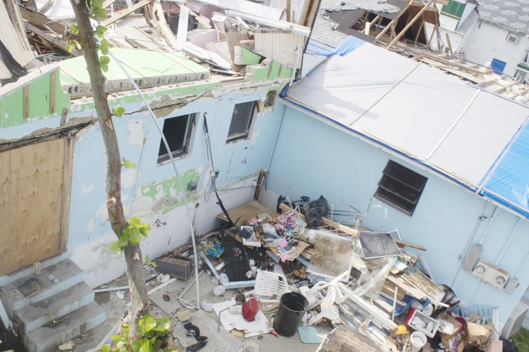 Debris and wrecked homes in Green Turtle Cay, Bahamas, Oct. 18, 2019. Hurricane Dorian tore through the area, bringing 185-mph winds nearly two months ago.