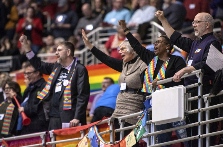 Protesters chant during the United Methodist Church's special session of the general conference in St. Louis on Feb. 26, 2019.