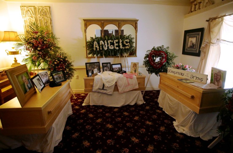 Image: The coffins of Rhonita Maria Miller and her four children, members of the Mexican-American Mormon community killed by unknown assailants, are pictured before their funeral in La Mora