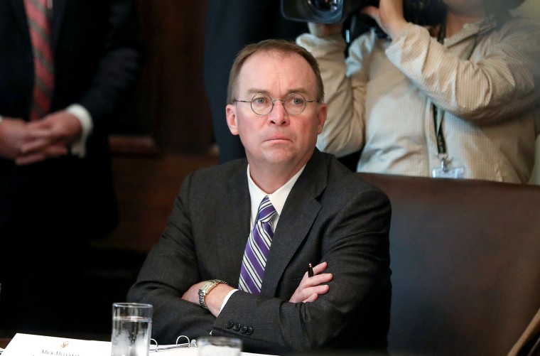 Image: Acting White House Chief of Staff Mulvaney listens during Trump cabinet meeting at the White House in Washington
