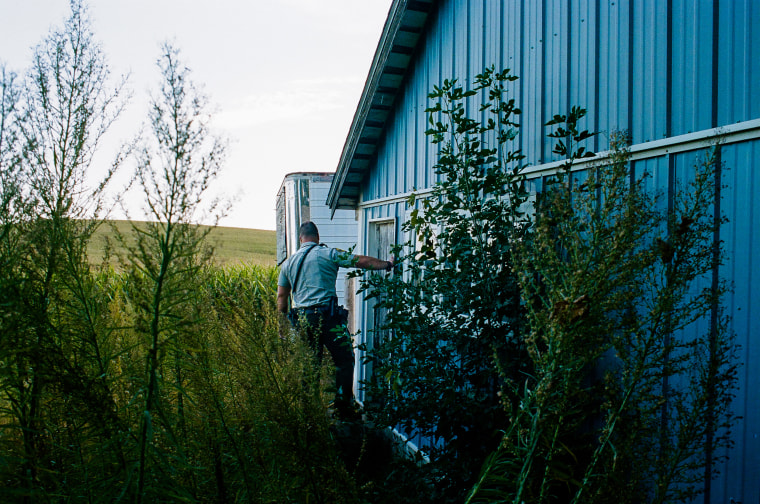 Officer Miller searches for a trespassing suspect in rural Anamosa, Iowa.