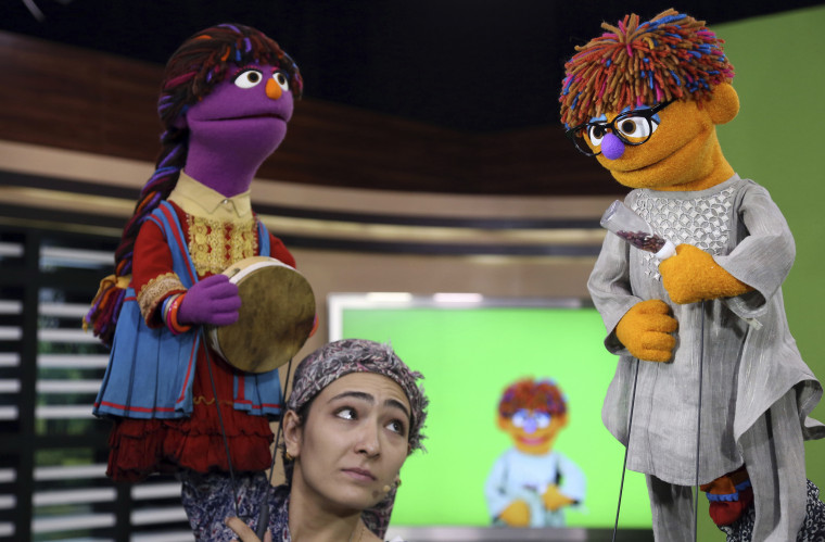 Afghan puppets Zari, left, and Zeerak record a a segment for the 6th season of Afghan Sesame Street "Baghch-e-Simsim" in Kabul in 2017.