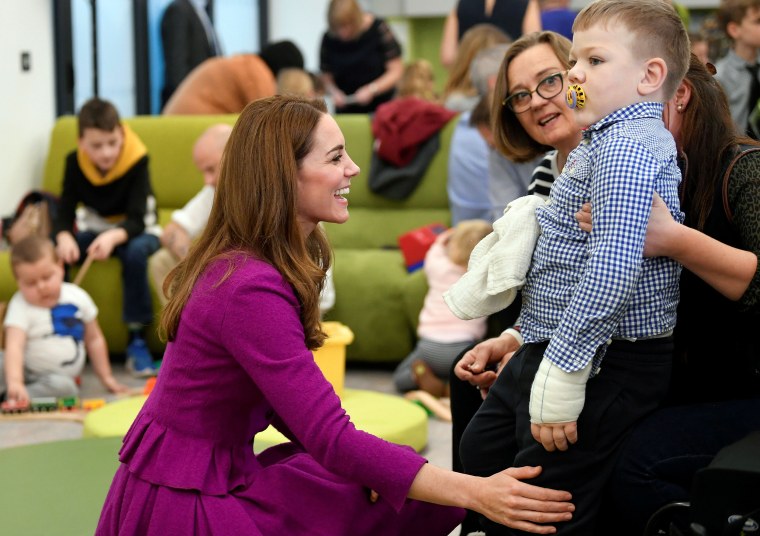 Kate Middleton wears fuchsia outfit for visit to children's hospice