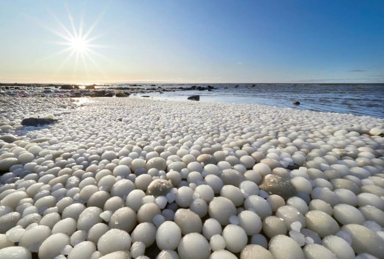Thousands of rare 'ice eggs' wash up on beach