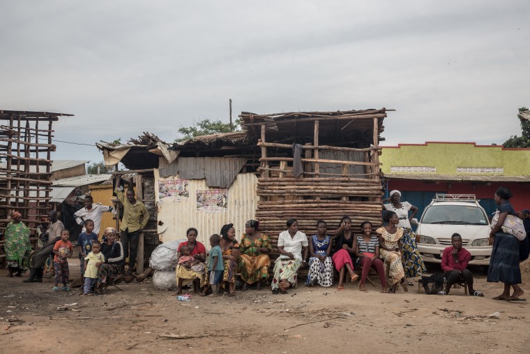 Image: Women gather to sit and chat in Nakivale refugee settlement in southwest Uganda. More than 100,000 refugees live there, according to the Ugandan government.