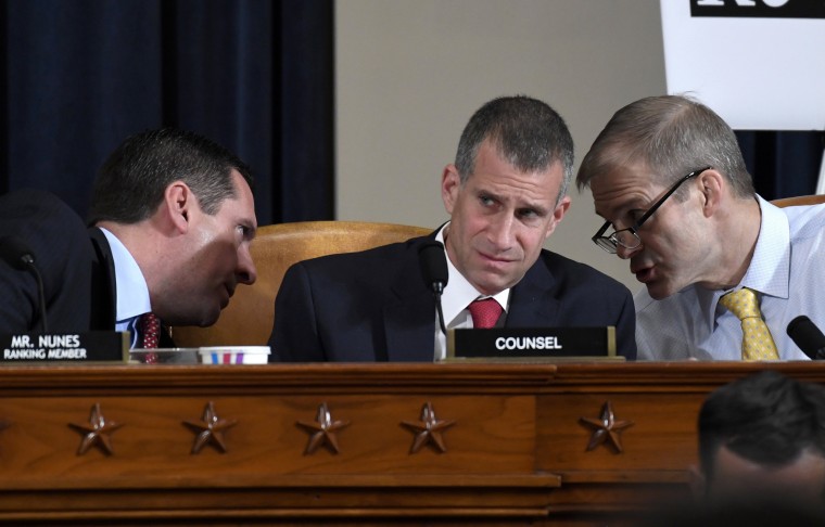 Image: Rep. Devin Nunes and Rep. Jim Jordan speak to Steve Castor, Republican staff attorney for the House Oversight Committee, on Nov. 13, 2019.