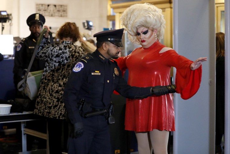 Image: Pissi Myles goes through security before a public impeachment hearing on Capitol Hill on Nov. 13, 2019.