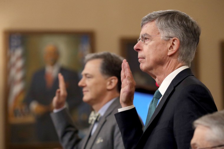 Image: Top U.S. diplomat to Ukraine, William B. Taylor (R), and Deputy Assistant Secretary for European and Eurasian Affairs George P. Kent (L) are sworn in prior to providing testimony to the House Intelligence Committee in the Longworth House Office Bui