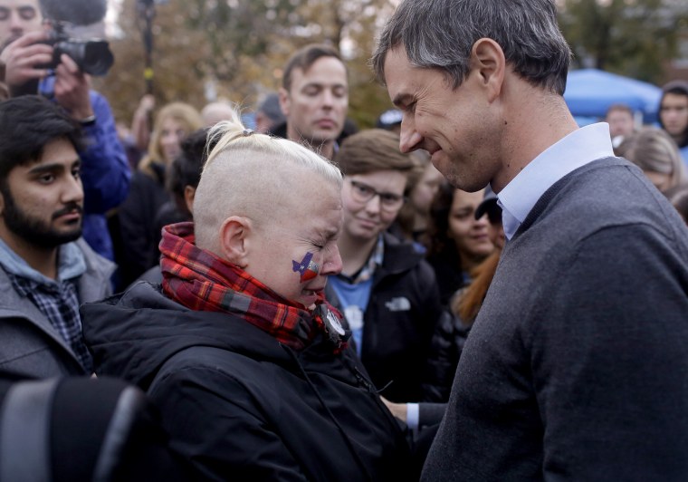 Image: Beto O'Rourke comforts a volunteer after announcing he was dropping out of the presidential race in Des Moines, Iowa, on Nov. 1, 2019.