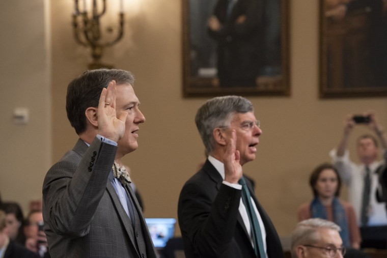 Image: Career Foreign Service officer George Kent, left, and top U.S. diplomat in Ukraine William Taylor, right, are sworn in to testify before the House Intelligence Committee on Capitol Hill
