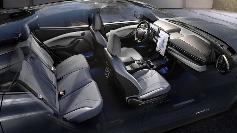 Image: A look at the Ford Mustang Mach-E interior, where knobs and switches have been replaced by a touchscreen.