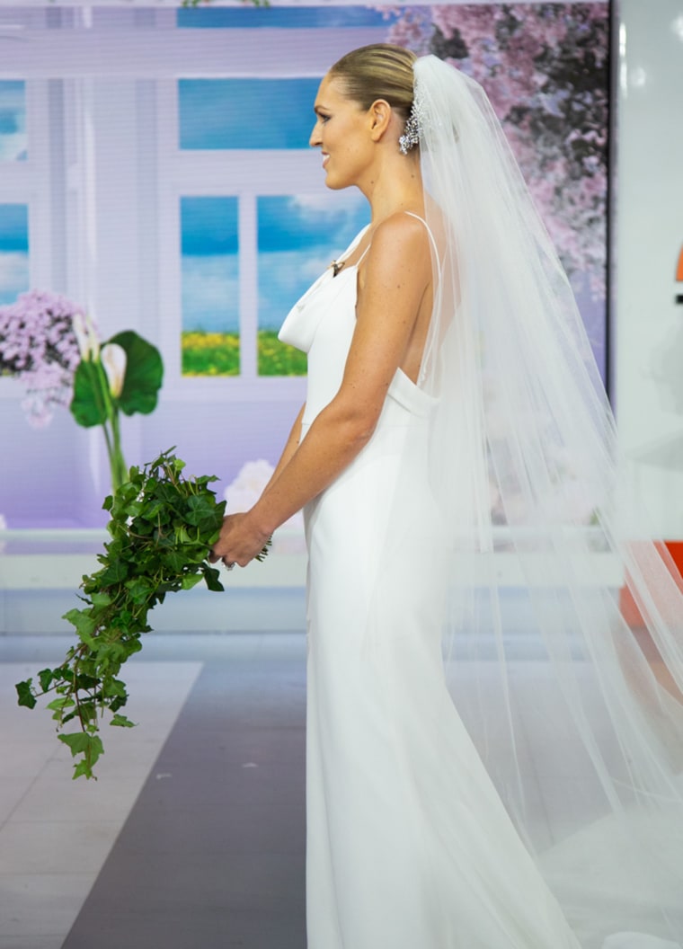 Another bride, Annie, stepped out in this sleek, asymmetrical gown. 